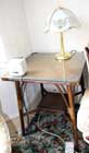 Glass-topped rattan table